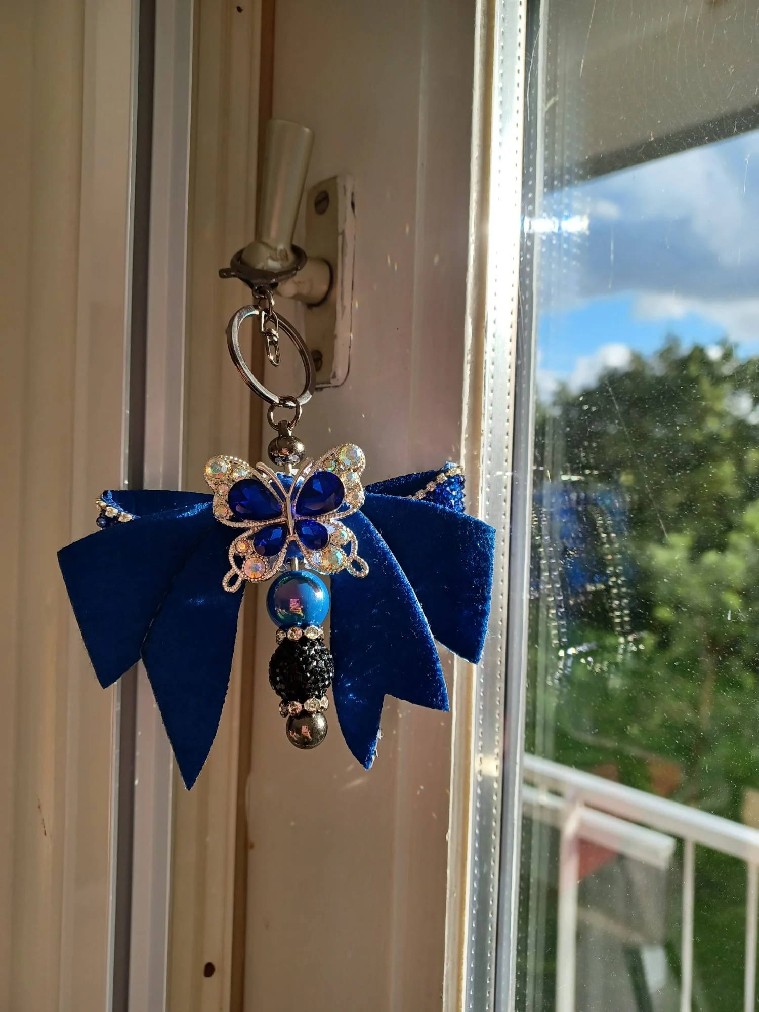 Vlinder & fluweel — Blauwe decoratieve sleutelhanger